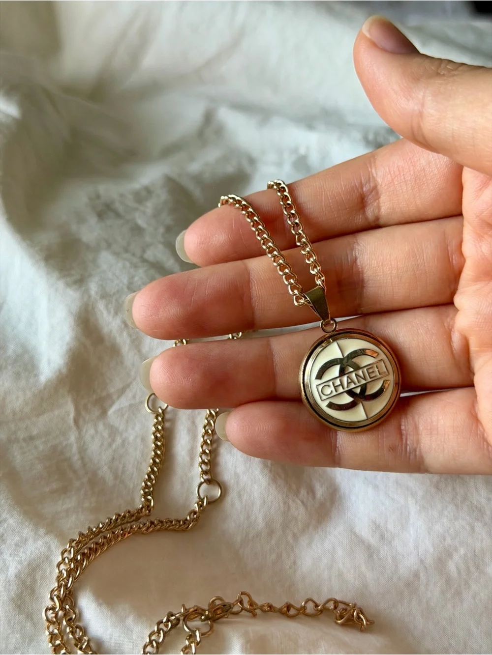 CHANEL Gold-tone Pendant Necklace with Cream Enamel CC Logo